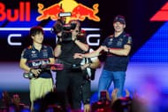 Red Bull's Yuki Tsunoda (L) and Max Verstappen (R) at the 2025 F1 Grand Prix of Qatar race weekend - Source: Getty