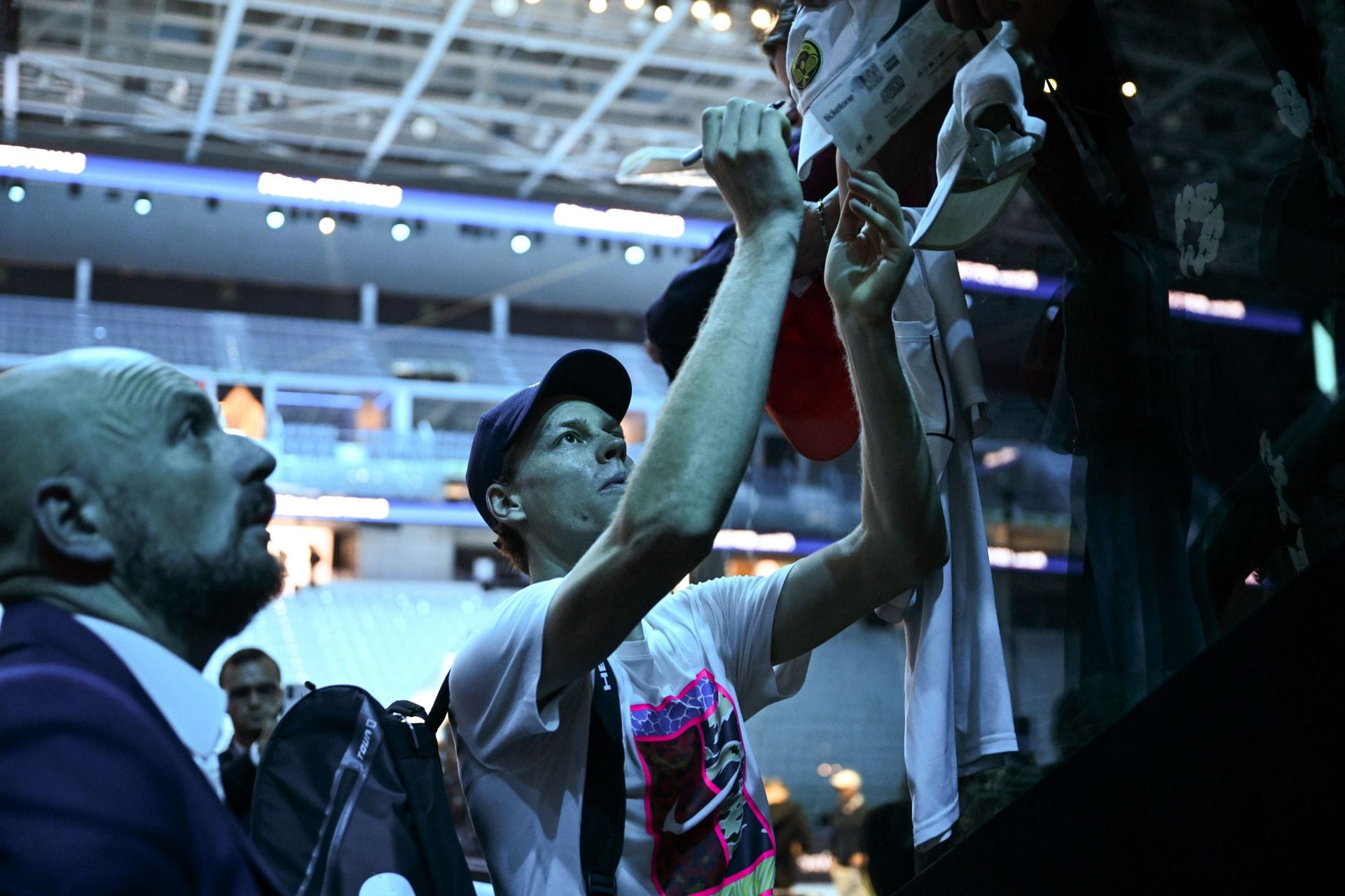 Jannik Sinner signing autographs for fans at the 2025 ATP Finals (Source: Getty)