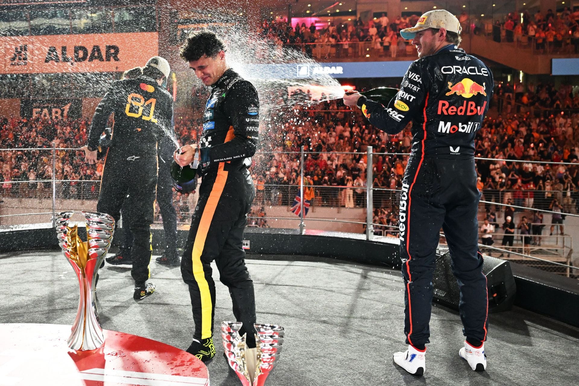 Max Verstappen of Red Bull Racing, Oscar Piastri and Lando Norris of McLaren on the F1 Grand Prix of Abu Dhabi podium. Source: Getty