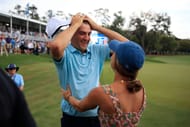 Scottie Scheffler celebrates with his wife after winning the Players Championship 2023 (Image Source: Imagn)