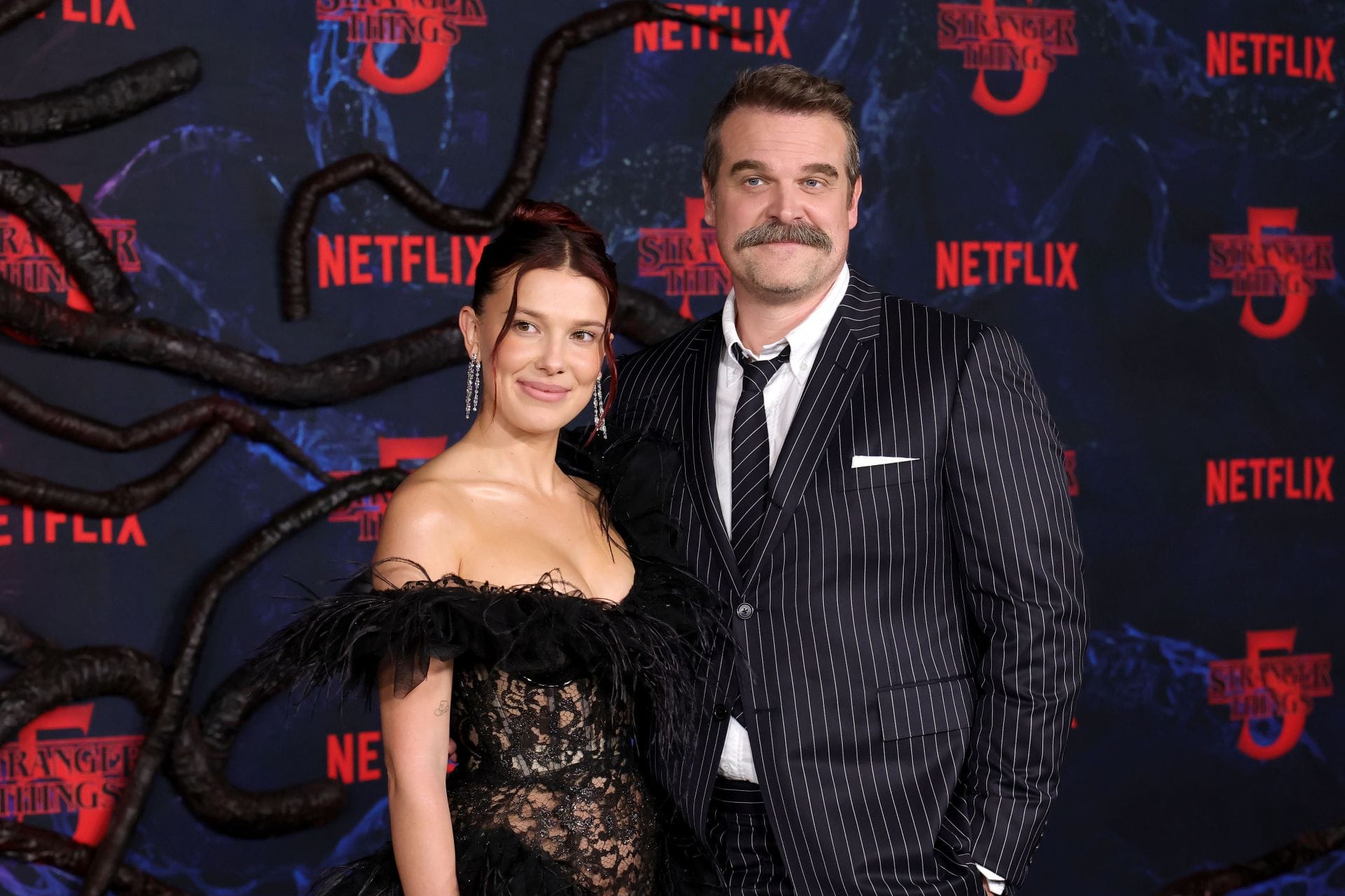 Millie Bobby Brown and David Harbour (Image via Getty Images)