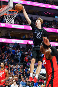 Dec 6, 2025; Dallas, Texas, USA; Dallas Mavericks forward Cooper Flagg (32) dunks during the fourth quarter against the Houston Rockets at American Airlines Center. Mandatory Credit: Andrew Dieb-Imagn Images