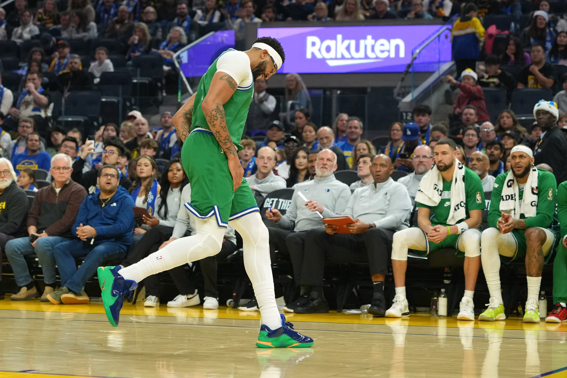 Dallas Mavericks forward Anthony Davis (3) reacts after suffering an injury during the second quarter against the Golden State Warriors at Chase Center. Mandatory Credit: Darren Yamashita-Imagn Images