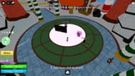 Stand inside the circle to receive Presents every hour (Image via Roblox)