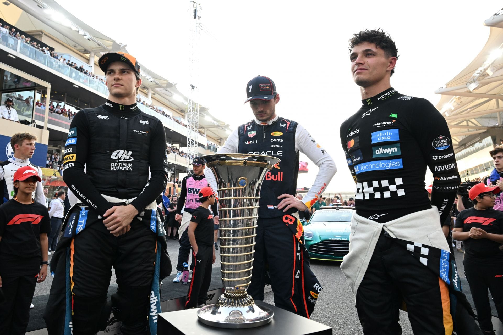McLaren&#039;s Oscar Piastri (L), Red Bull&#039;s Max Verstappen, McLaren&#039;s Lando Norris (R) at the 2025 F1 Grand Prix of Abu Dhabi - Source: Getty