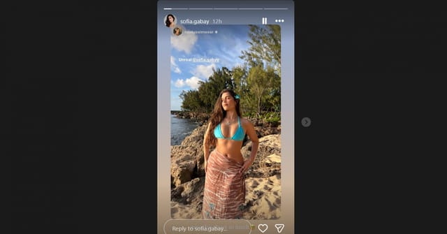 Drake London's gf Sofia Gabay shows off coral blue swimsuit during seaside photoshoot//@sofia.gabay