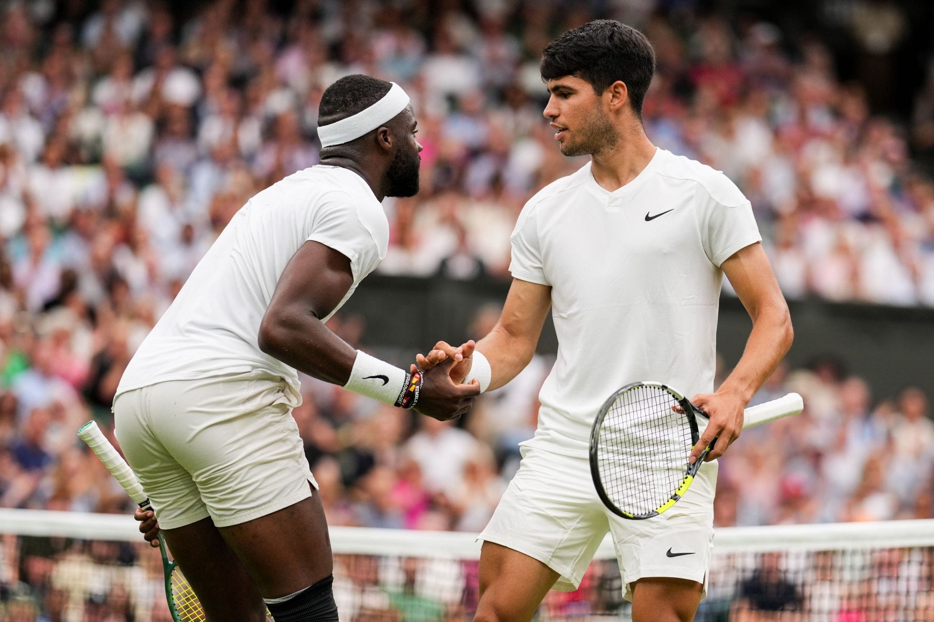 Frances Tiafoe (left) and Carlos Alcaraz (right) at the 2024 Wimbledon Championships (Source: Getty)