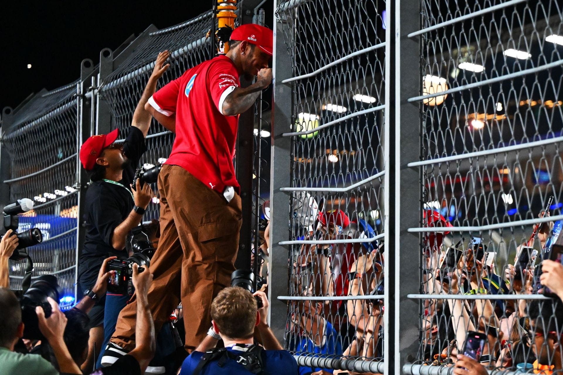 Lewis Hamilton greets fans at the F1 Singapore Grand Prix - Source: Getty
