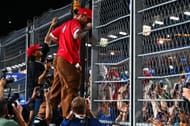 Lewis Hamilton greets fans at the F1 Singapore Grand Prix - Source: Getty