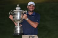 Scottie Scheffler poses with the 2025 PGA Championship (Image Source: Getty)