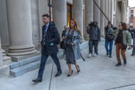 Denny Hamlin (L) and wife Jordan Fish depart the North Carolina Federal courtroom. Source: Getty