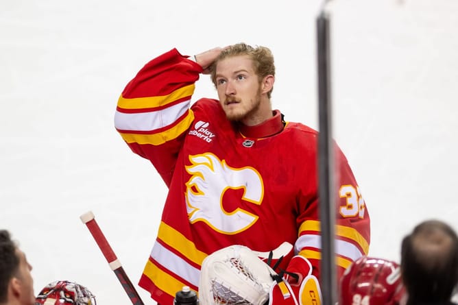 [Watch] Flames' Dustin Wolf proposes to now-fiancee Sawyer Norman with a huge diamond engagement ring