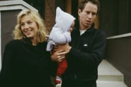 Tatum O'Neal (left) and John McEnroe (right) with one of their children in 1987 (Source: Getty)