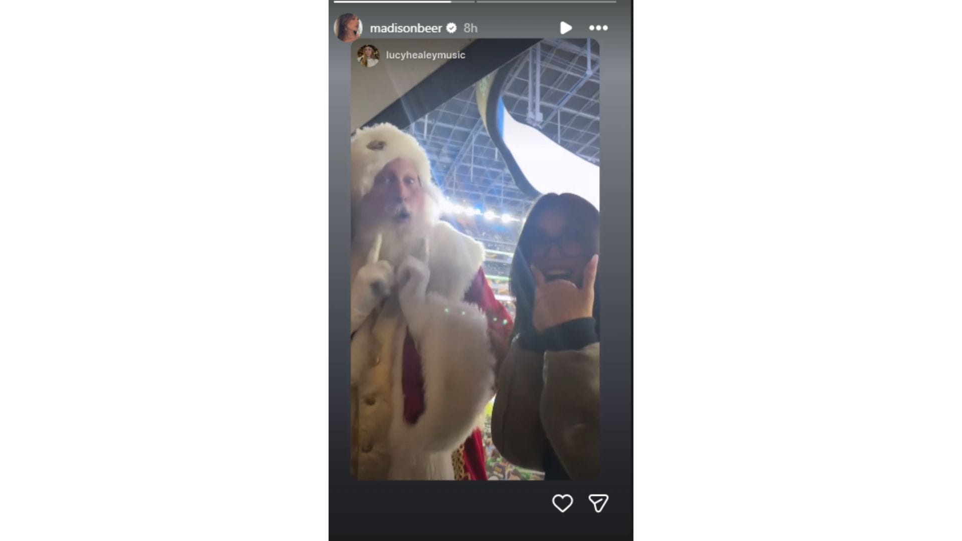 Madison Beer met up with Santa at the Chargers game. (Credit: @ madisonbeer)