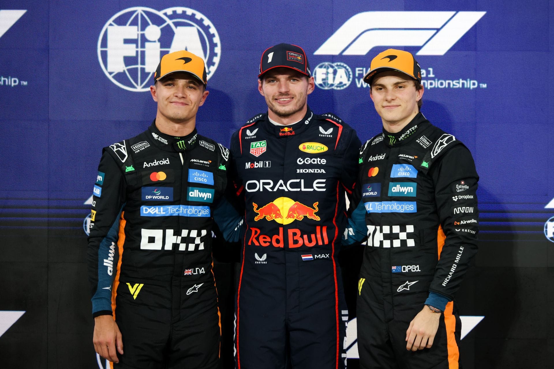 (L-R) Max Verstappen of Red Bull Racing, Lando Norris, and Oscar Piastri of McLaren before the Abu Dhabi GP. Source: Getty