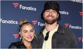 Jake Ferguson’s fiancée Haley Cavinder bats for Cowboys QB while showing off all-black fur trench coat outfit for Cowboys vs. Lions TNF clash