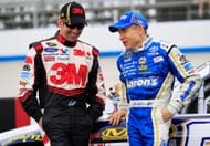 Greg Biffle talks to Mark Martin before the NASCAR Cup Series race at Dover. Source: Getty