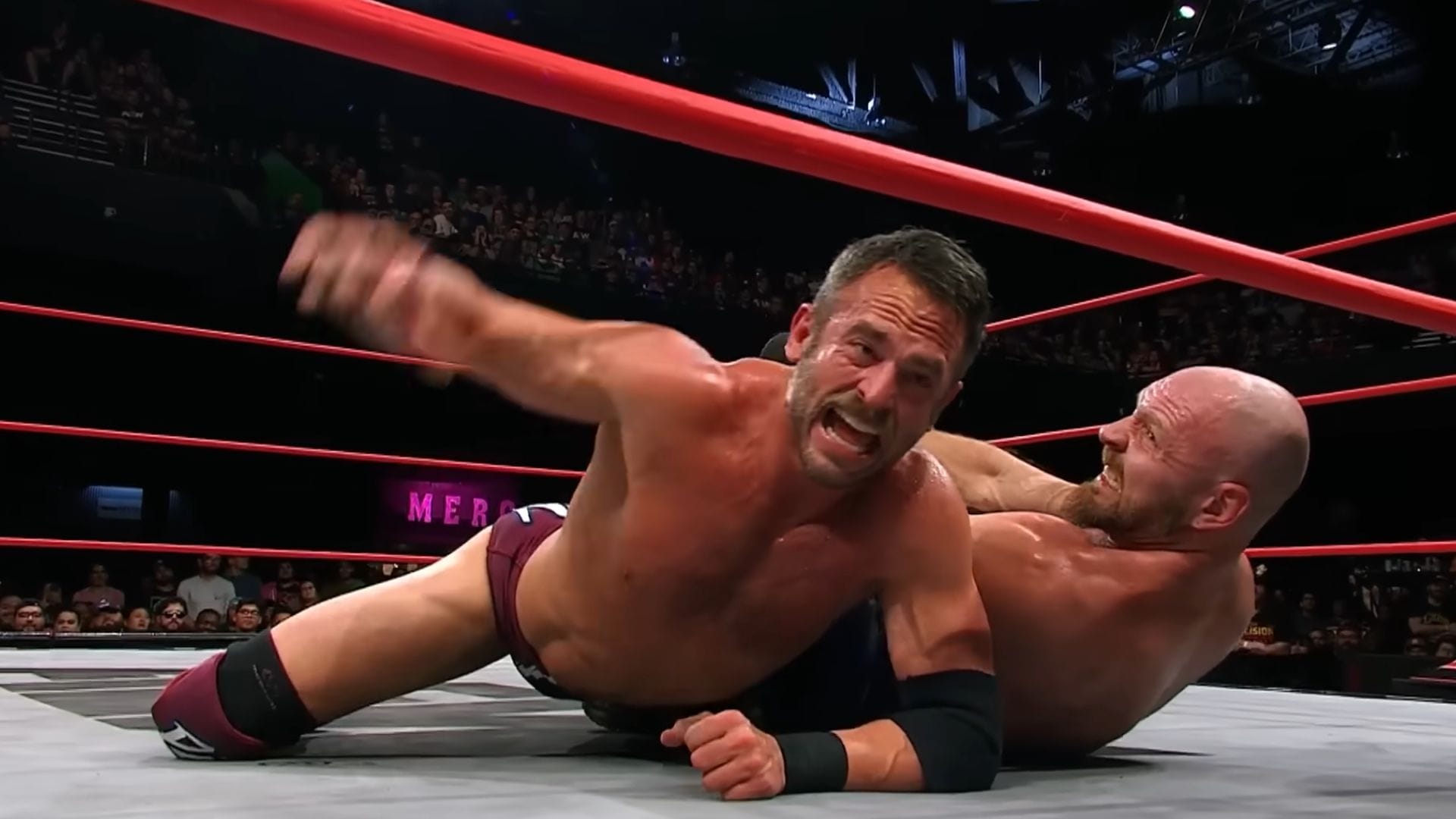 Roderick Strong wrestling Jon Moxley on AEW Collision [Source: AEW on YouTube]