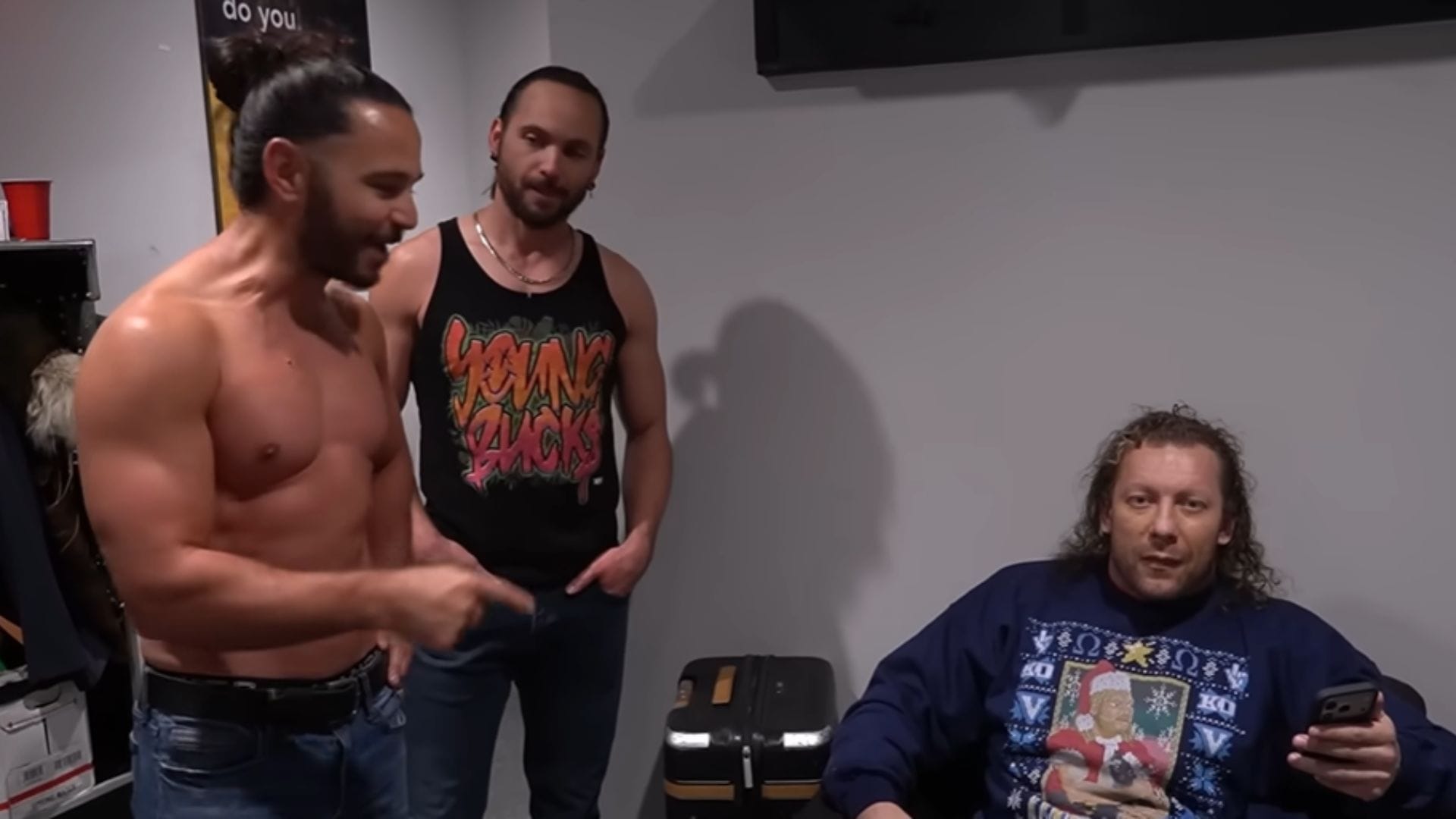 Kenny Omega and The Young Bucks [Source: Being The Elite on YouTube]