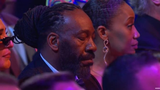 Booker T taken out mid-match; 310-lbs WWE star flies at him