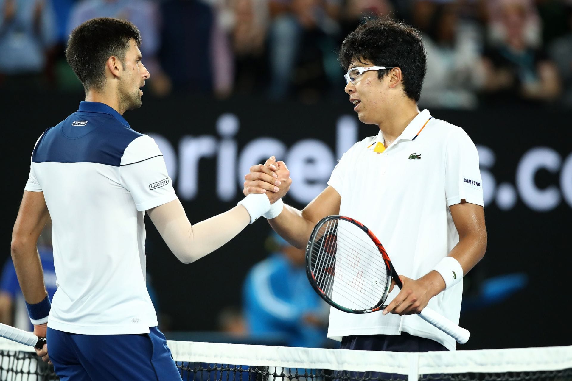 Novak Djokovic and Hyeon Chung at the Australian Open 2018. (Photo: Getty)