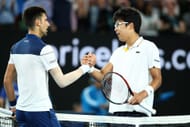 Novak Djokovic and Hyeon Chung at the Australian Open 2018. (Photo: Getty)