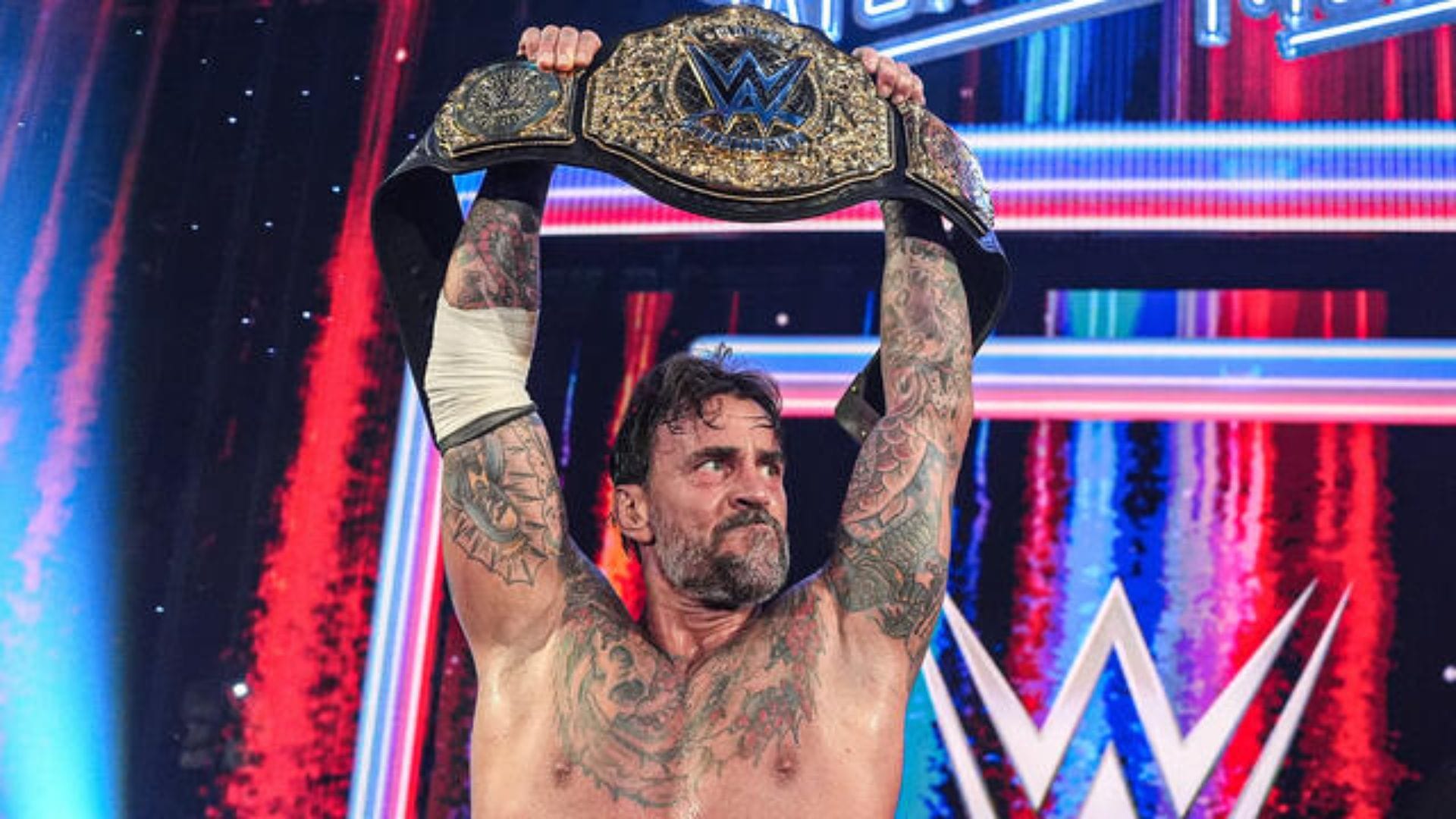 CM Punk as the World Heavyweight Champion [Image Credits: WWE.com]