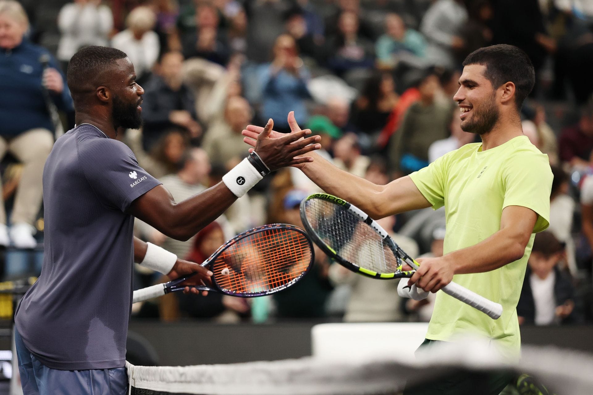 Frances Tiafoe (left) and Carlos Alcaraz (right) at A Racquet At The Rock in New Jersey (Source: Getty)