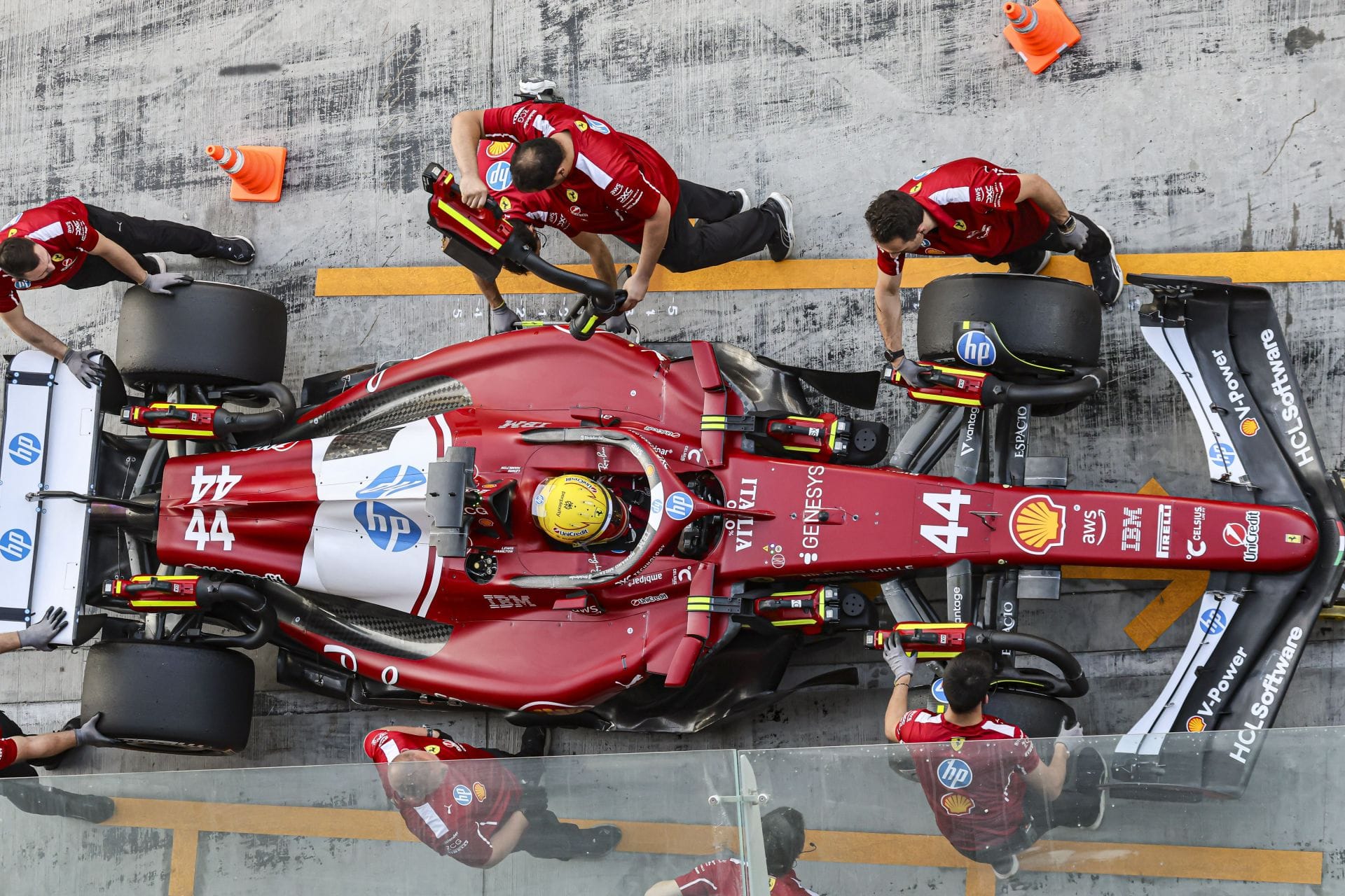 Lewis Hamilton with Ferrari engineers at Pirelli testing. Source: Getty