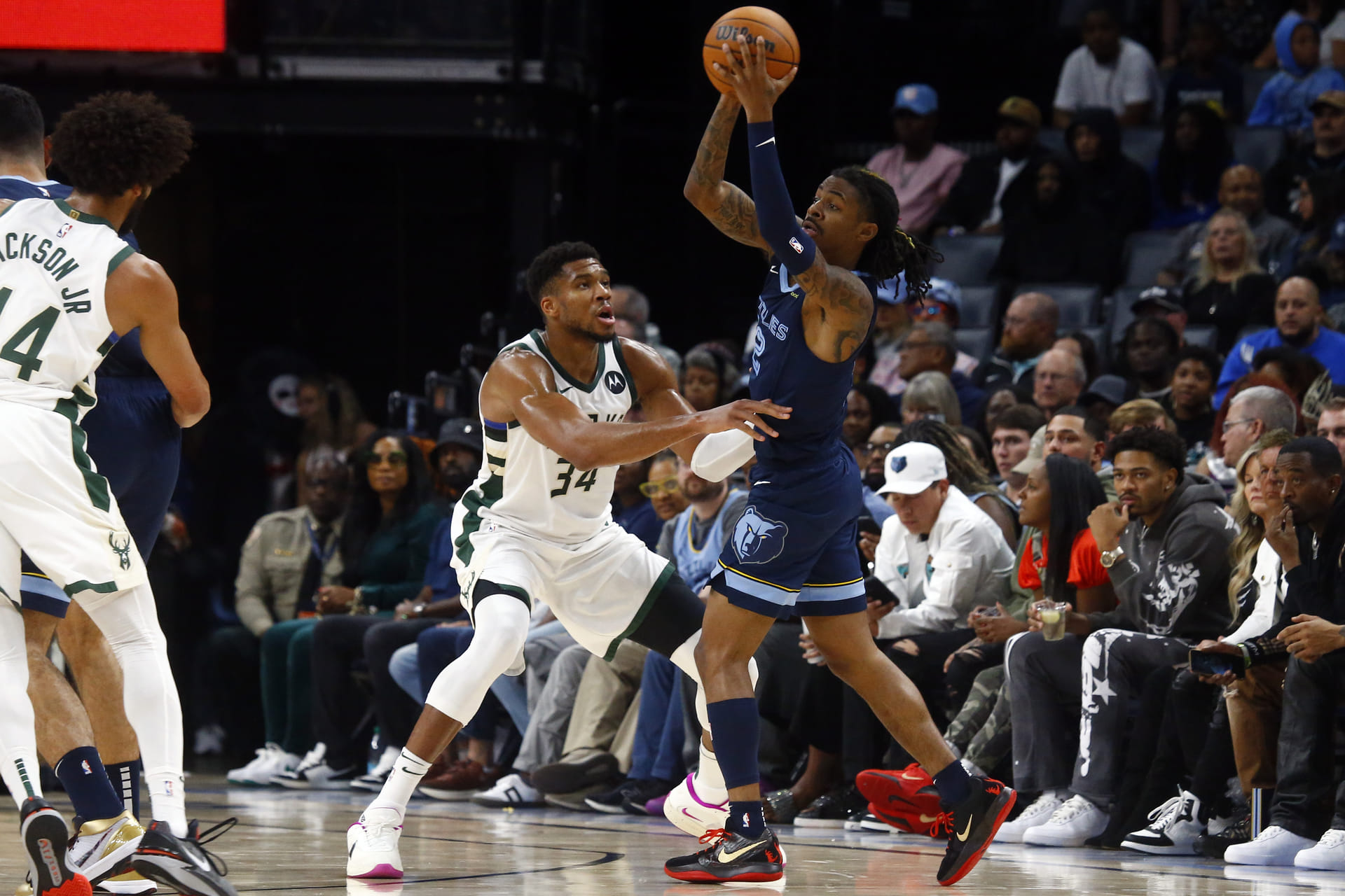 Memphis Grizzlies guard Ja Morant (12) drives to the basket past Sacramento Kings forward Domantas Sabonis (10) - Source: Imagn