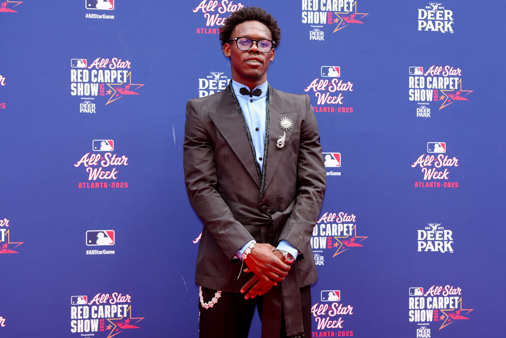 Jazz Chisholm Jr.'s fiancee Ahnalys Santiago turns up the style meter in black mesh with a cheeky nod to their romance