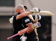 Daryl Mitchell hugs Glenn Phillips after his ton. (Credits: Black Caps X)
