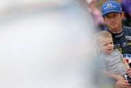 Kasey Kahne with his son, Tanner, at Michigan. Source: Getty