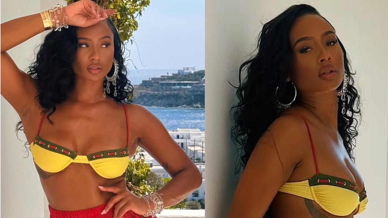 [WATCH] Kayla Nicole shows off black thigh-high slit halter-neck gown with 