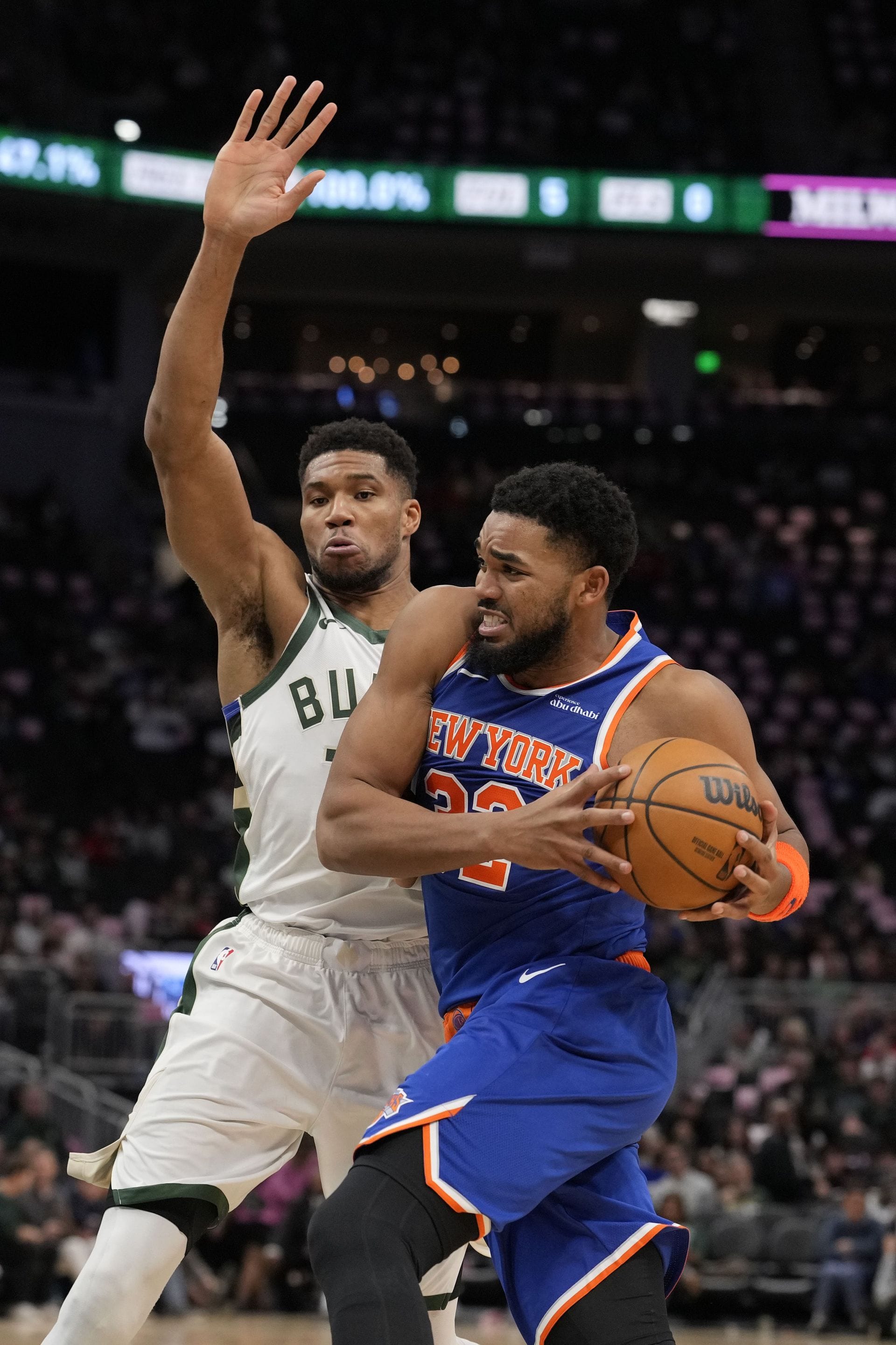 Karl-Anthony Towns #32 of the New York Knicks dribbles the ball against Giannis Antetokounmpo #34 of the Milwaukee Bucks during the third quarter at Fiserv Forum on October 28, 2025 in Milwaukee, Wisconsin - Source: Getty