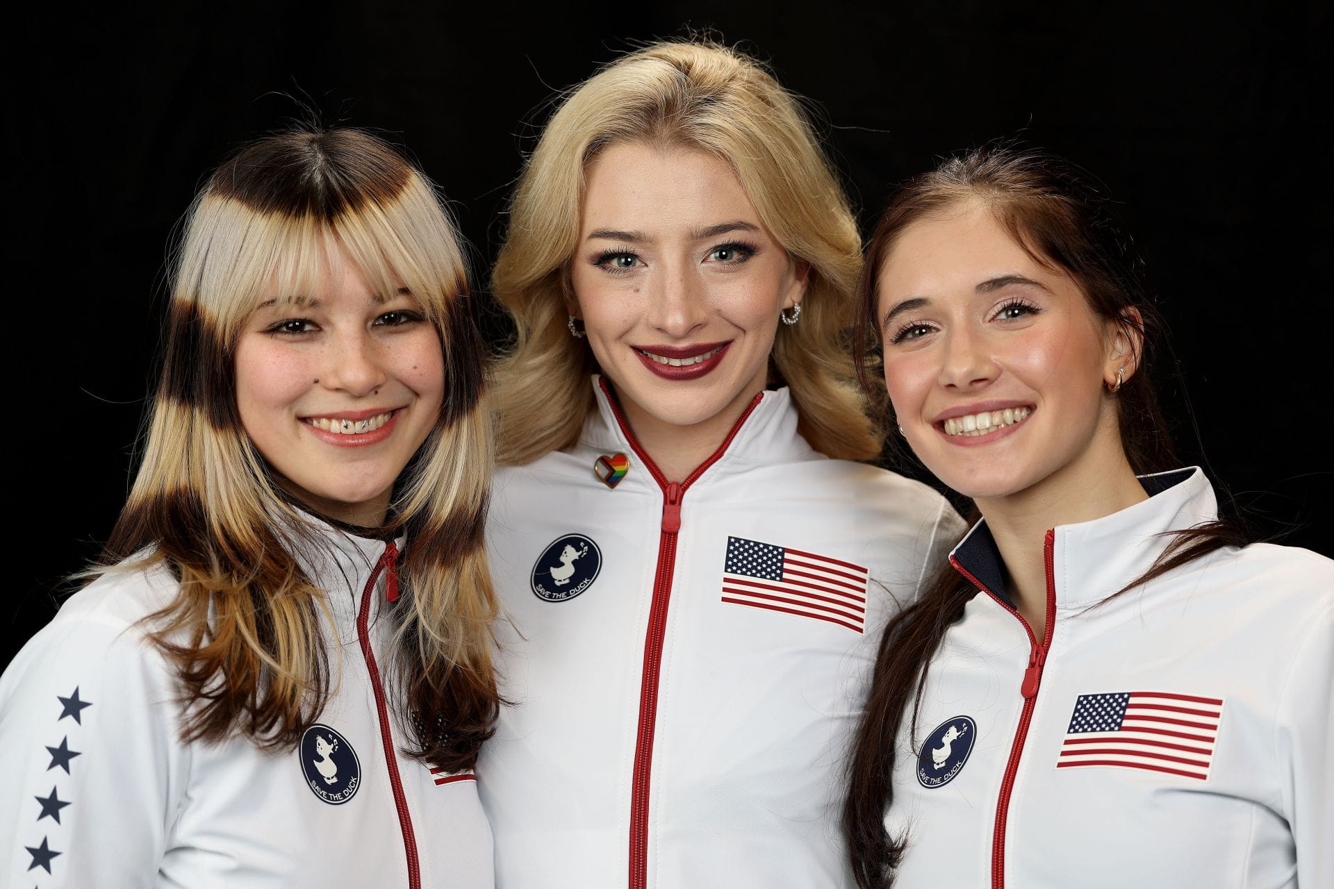 Alysa Liu, Amber Glenn, and Isabeau Levito pose for a portrait after making the United States Figure Skating Olympic Team. (Photo by Getty Images)