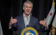 Gavin Newsom speaks at the podium - Source: Imagn