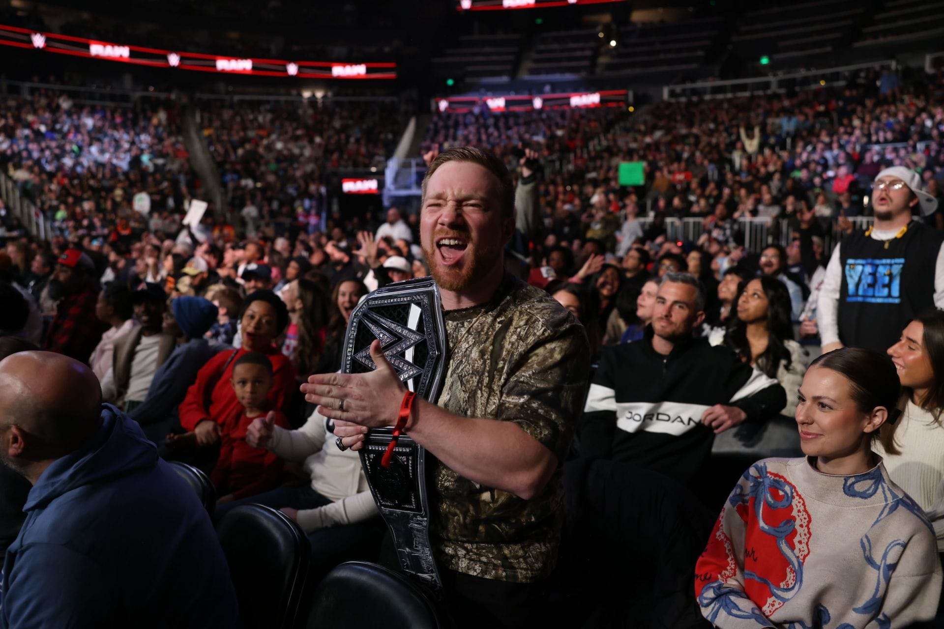 Watch: Tyler Reddick and CM Punk storm WWE Raw as Michael Jordan’s NASCAR driver delivers grand burnout