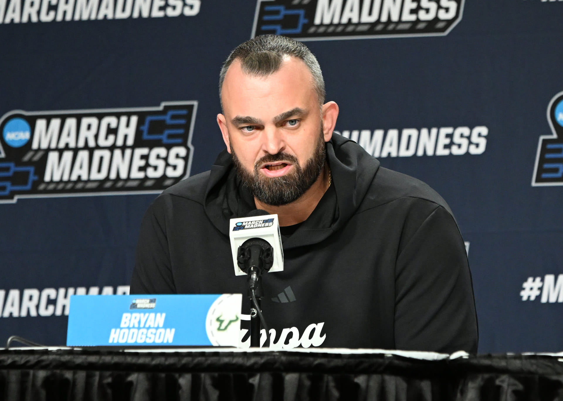 “Garbage coach,” “Syracuse got punked”: College hoops fans react as USF’s Bryan Hodgson set to take Providence job