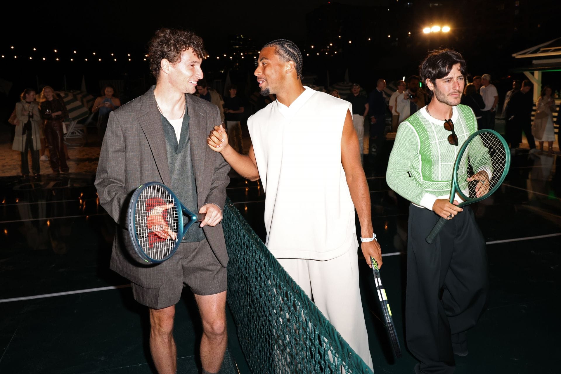 Ugo Humbert and Arthur Fils (centre in white) at a Lacoste event - Source: Getty