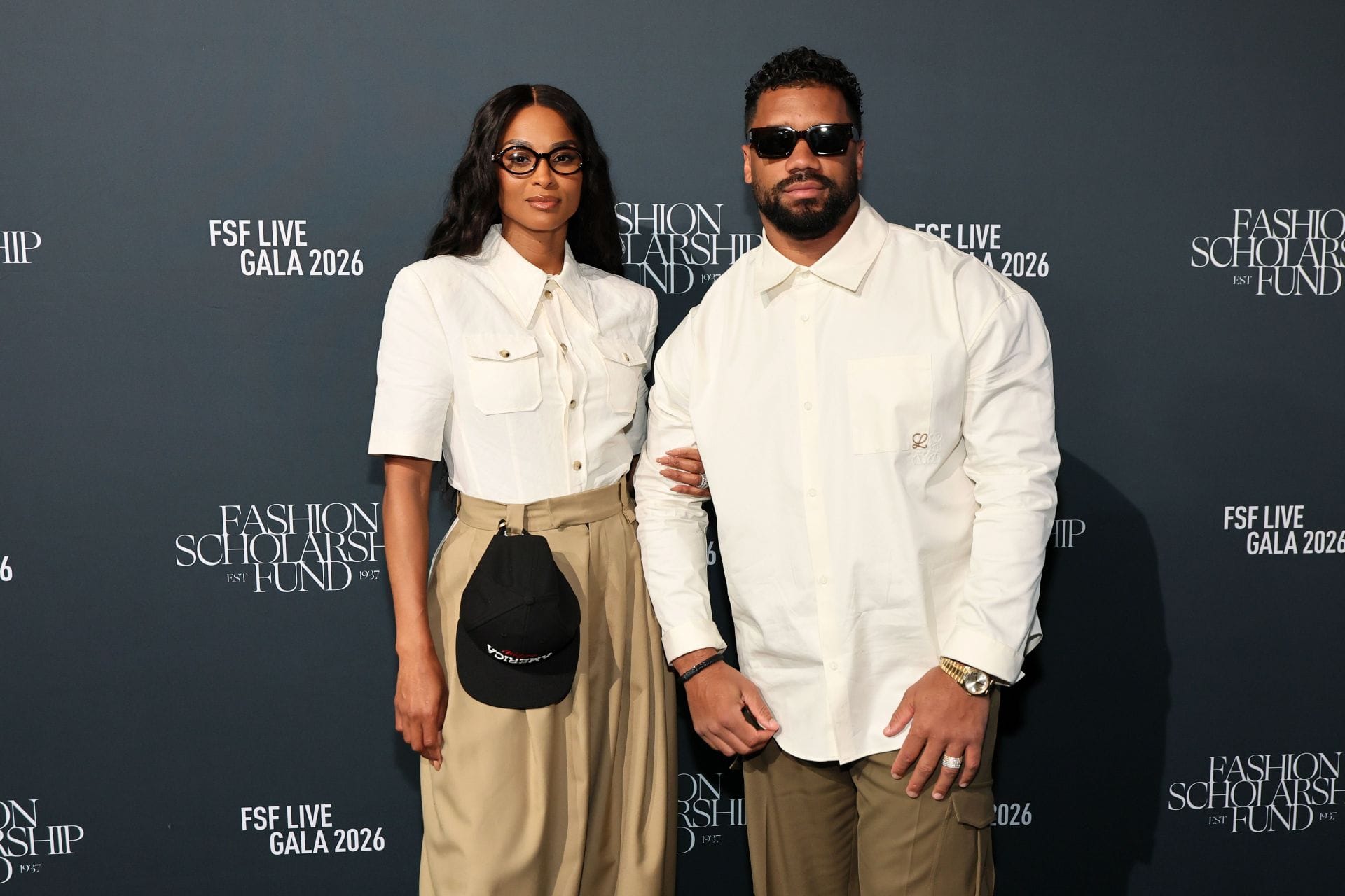 Russell Wilson’s wife Ciara turns heads in red bodysuit with ostrich-feathered thigh-high slit skirt at Con Cora foundation gala