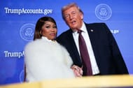 Nicki Minaj (L) joins U.S. President Donald Trump on stage as he delivers remarks during the Treasury Department's Trump Accounts Summit - Source: Getty