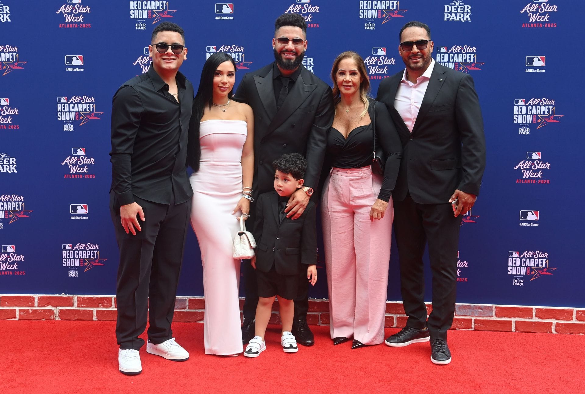 Gleyber Torres' wife Elizabeth poses in colorful bikini with her gal pals on a sunny day at a beach