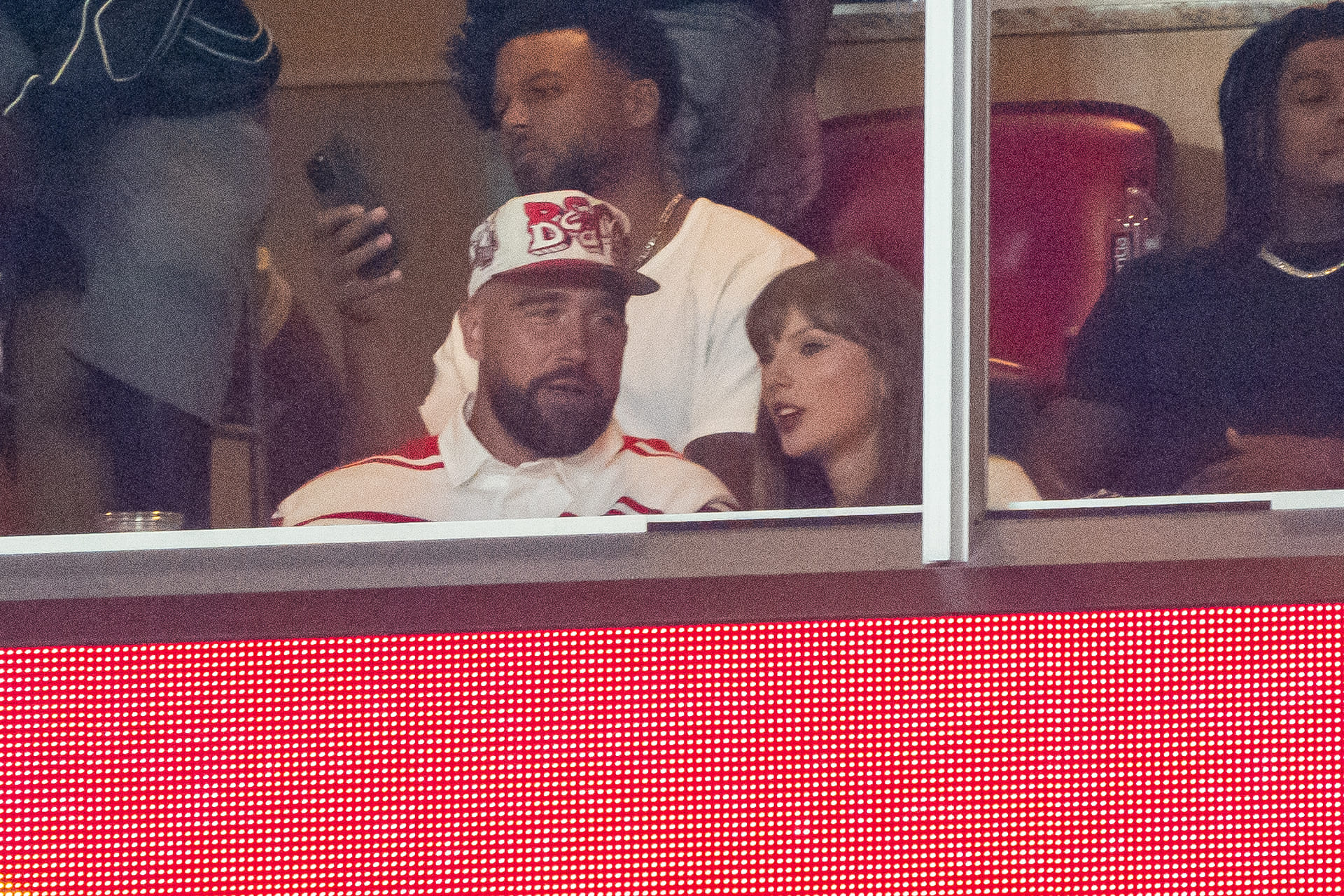 NFL fans torch TMZ for igniting Taylor Swift rumor mill after Travis Kelce's fiancee steps out in white outfit