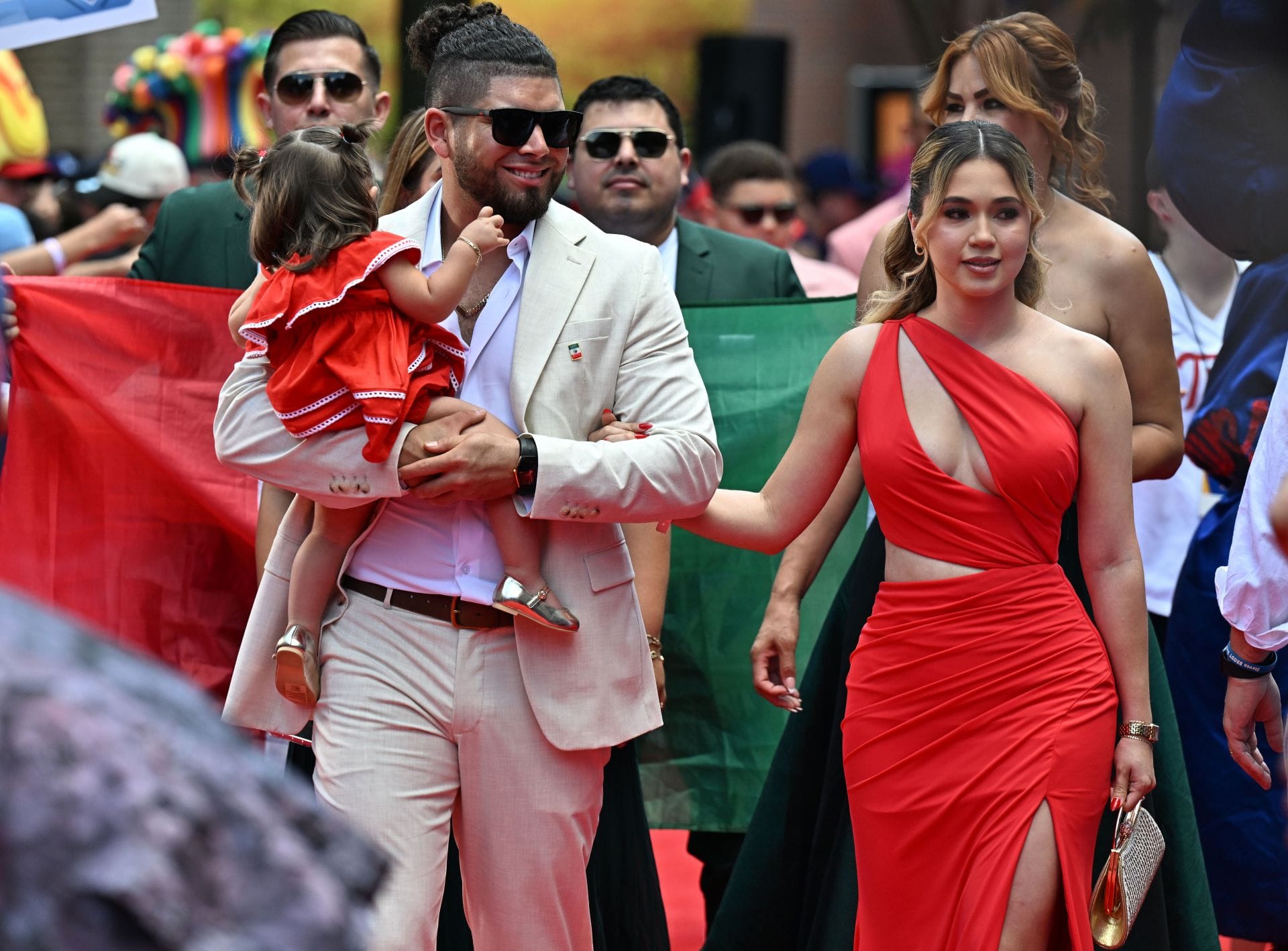 Jonathan Aranda's wife Milka soaks up the sun in a pink one-piece swimsuit during a serene beach outing