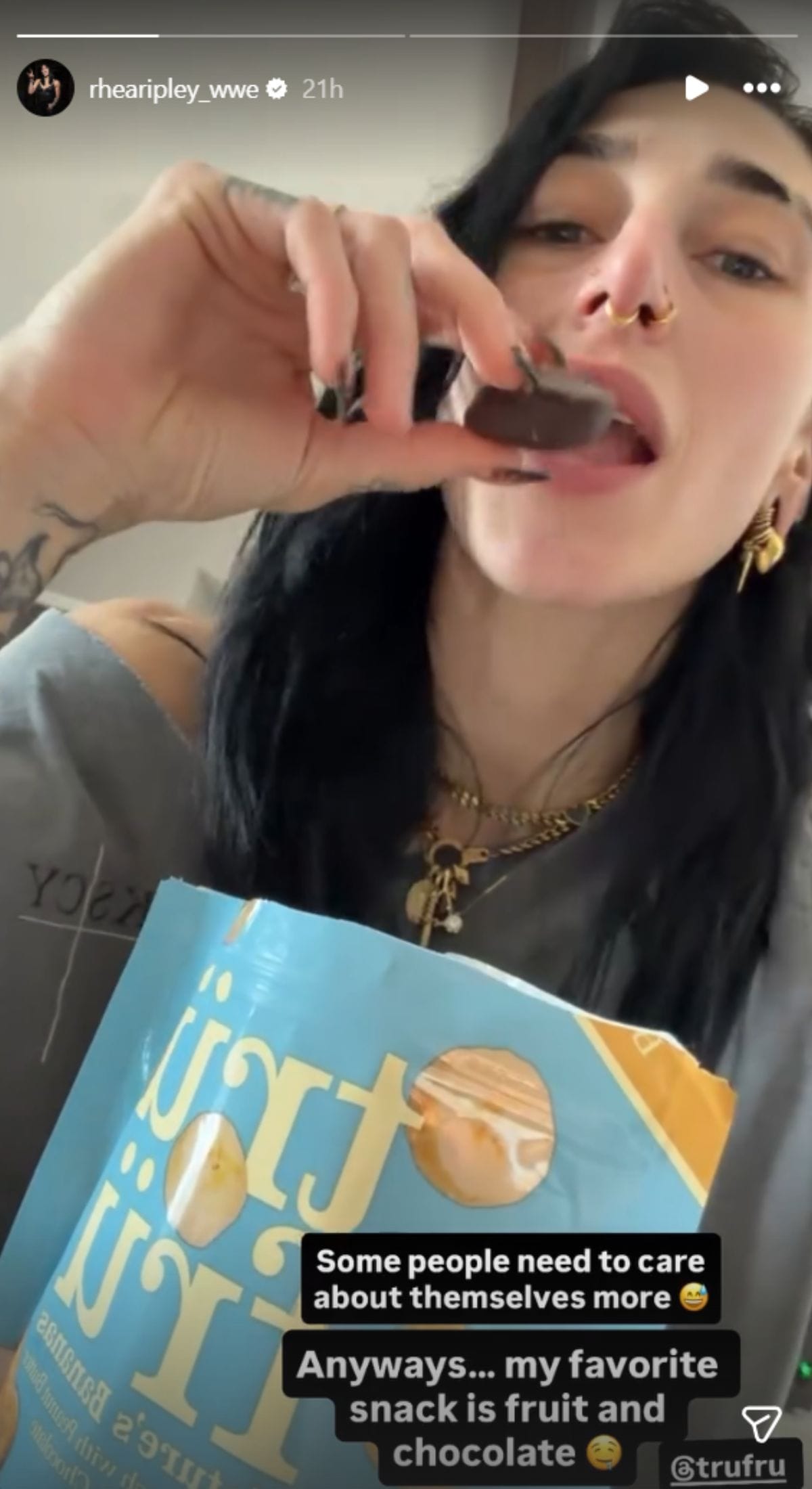 Rhea Ripley having a snack (Image via Instagram/@rhearipley_wwe)