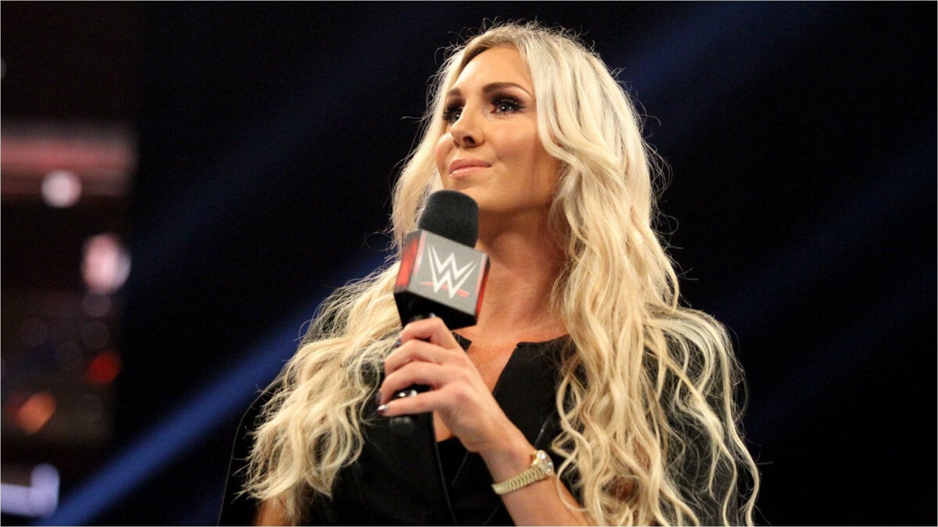 Current WWE champion breaks character to send a special message to Charlotte Flair