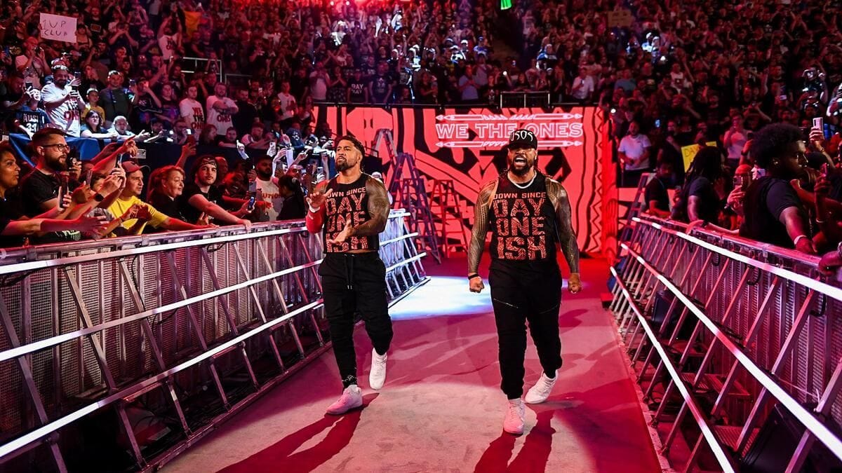The Usos were forced to fight people in high school because of what Rikishi did
