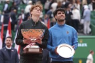 Jannik Sinner (left) and Carlos Alcaraz (right) during the 2026 Monte-Carlo Masters' men's singles trophy presentation ceremony (Source: Getty)