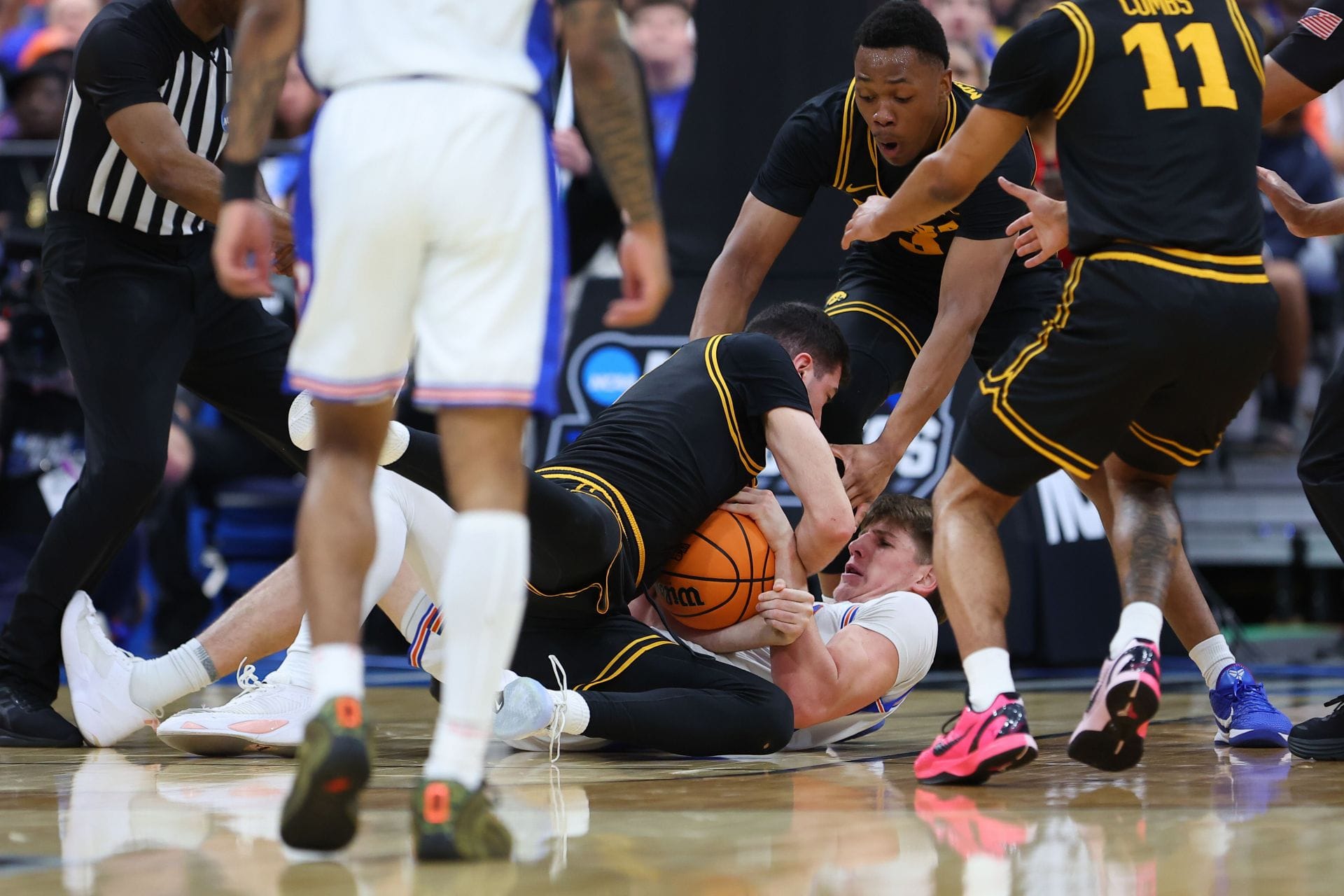 Ex-NFL star Antonio Brown gets fired up as he falls for AI-generated video of Iowa’s Alvaro Folgueiras punching Florida’s Alex Condon